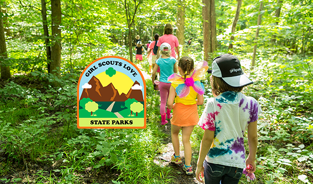 Girls Hiking in the forest with featured patch in the foreground